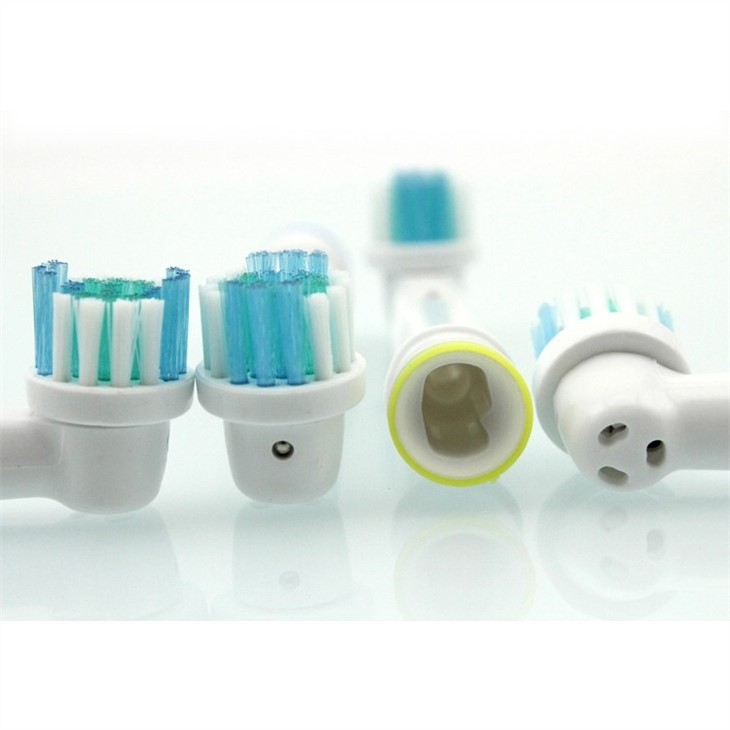 Cabeça de escova de dentes rotativa
