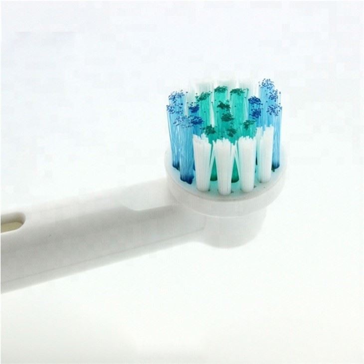 Cabeça de escova de dentes rotativa